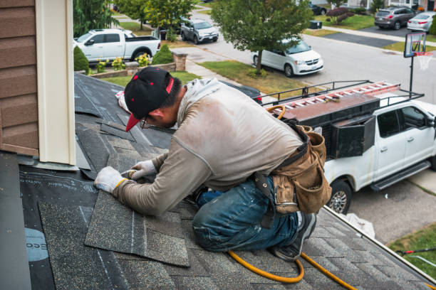 Professional Emergency Roof Repair technician working in Saint George, KS